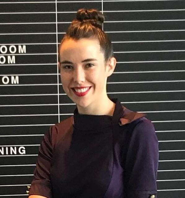 female flight attendant smiling